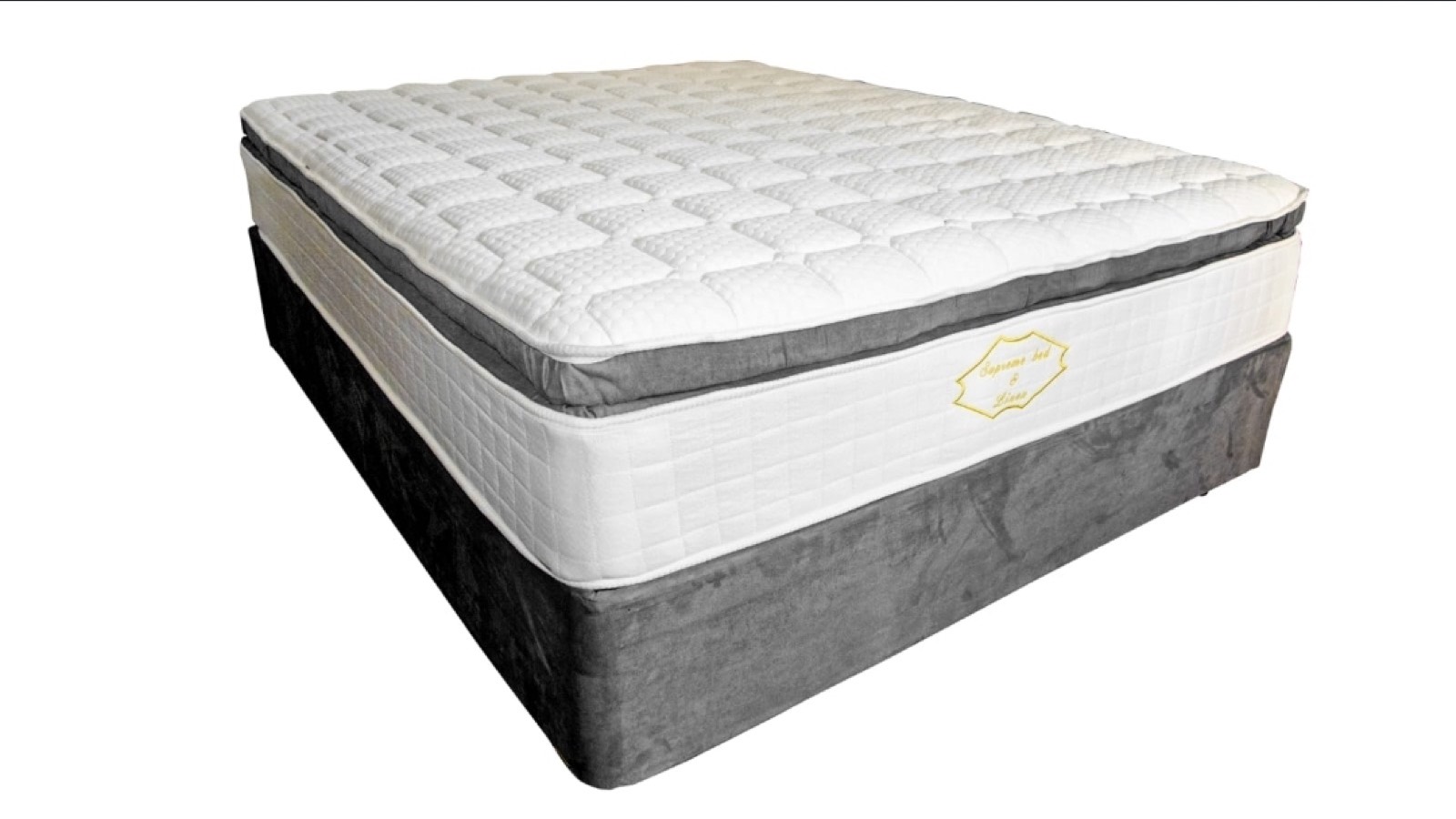 Supreme Bed & Linen Pillow-Top bed set on a plush grey base